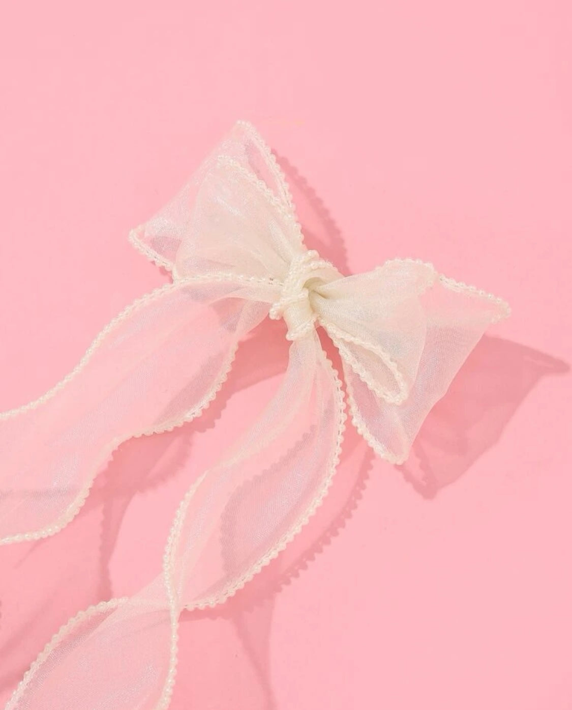 Cream bow and ribbons clip